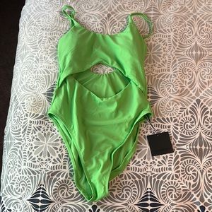 Nwt lime green one piece cutout size small